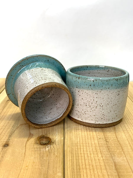 Handmade stoneware butter keeper in speckled clay with spiced cream and teal glaze