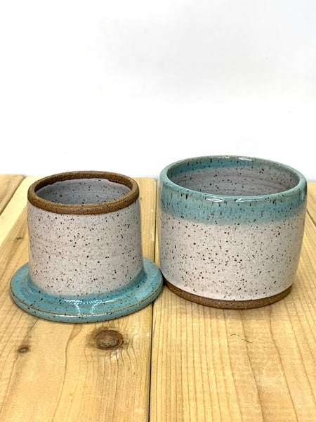 Handmade stoneware butter keeper in speckled clay with spiced cream and teal glaze