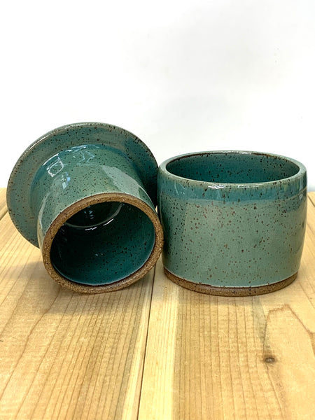 Handmade stoneware butter keeper in speckled clay with teal glaze