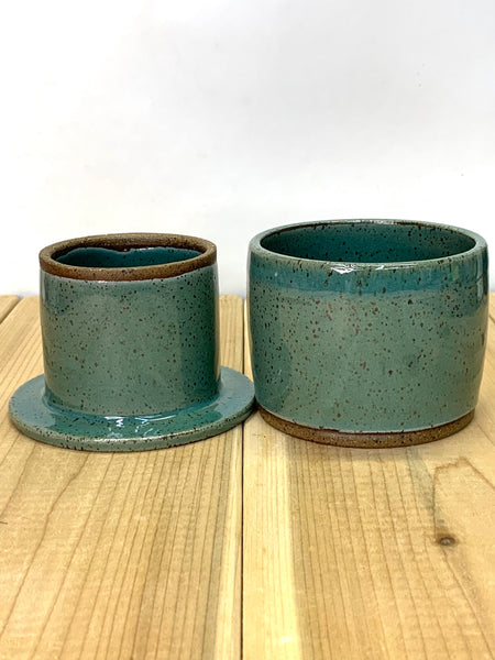 Handmade stoneware butter keeper in speckled clay with teal glaze