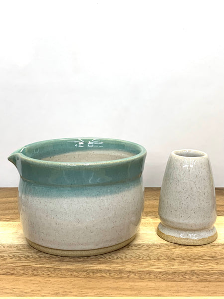 Handmade stoneware matcha bowl in spiced cream and teal glaze