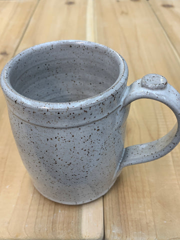 Mug in speckled clay and Spiced Cream glaze