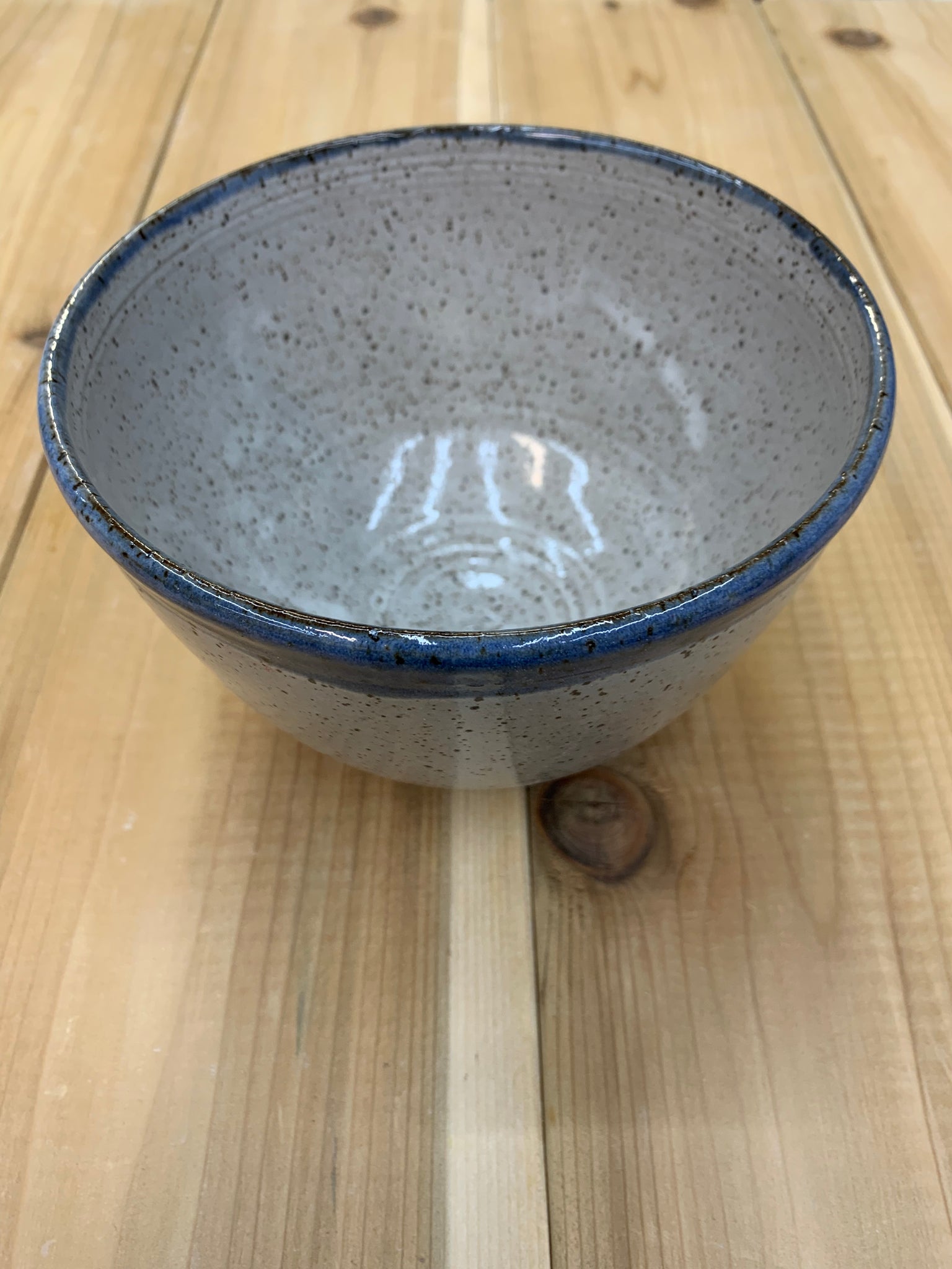 Noodle bowl in speckled clay with Spiced Cream and Blue glaze