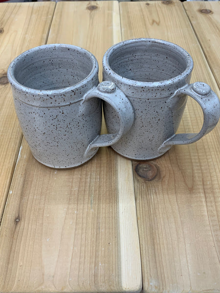 Mug in speckled clay and Spiced Cream glaze