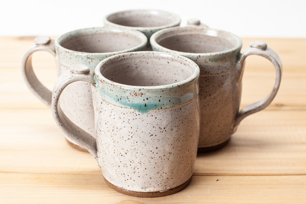 Mug in Spiced Cream and Teal glaze